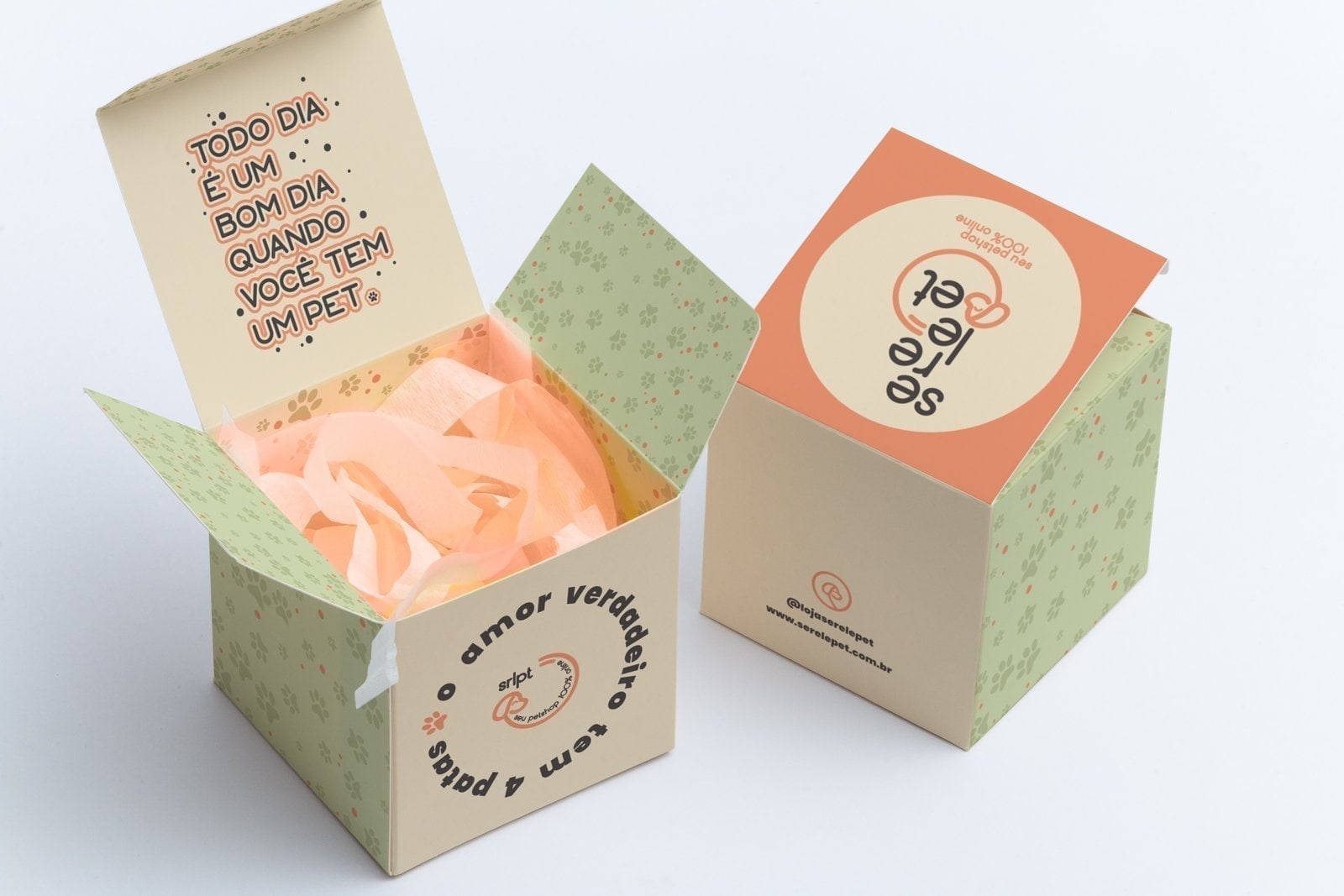 Hero shot of Serelepet retail packaging: stacked boxes and bags printed with the wordmark, coral and green brand colours, and pet-care product photography.